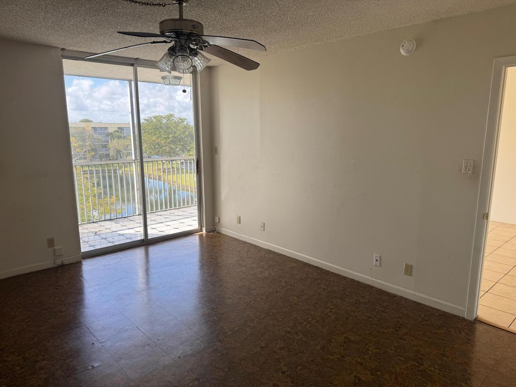Photo of 3141 NW 47th Terrace #430, Lauderdale Lakes, FL 33319 (MLS # B26007805)