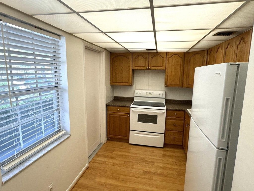 Photo of 2600 S Course Drive #108, Pompano Beach, FL 33069 (MLS # F10531346)