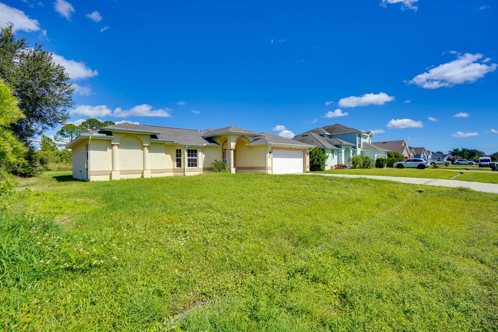 Photo of 1581 SW Crater Avenue, Port Saint Lucie, FL 34953 (MLS # R11132209)