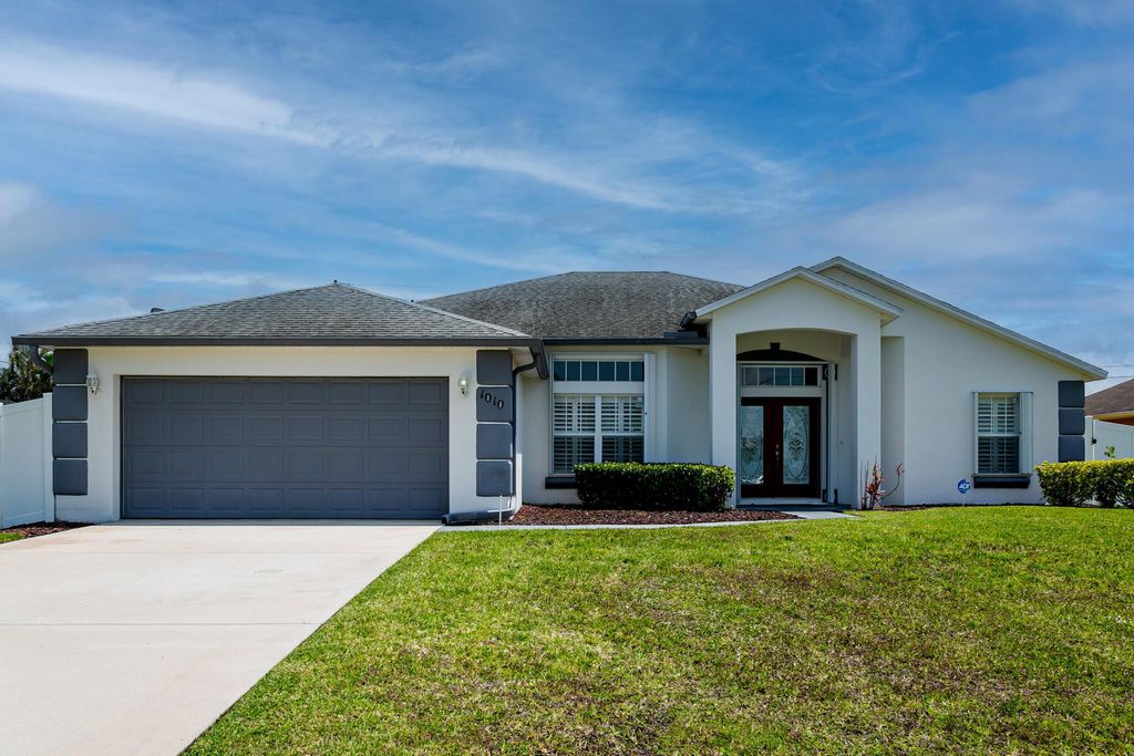 Photo of 1010 SW Facet Avenue, Port St Lucie, FL 34953 (MLS # R10896085)