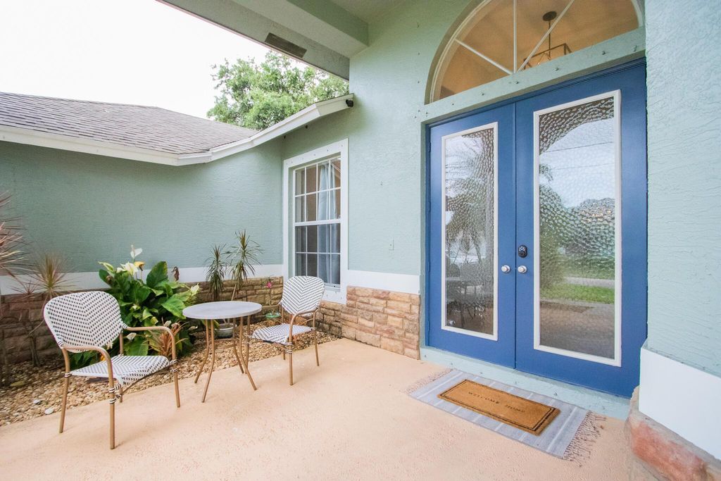 Photo of 1312 SW Jericho Avenue, Port Saint Lucie, FL 34953 (MLS # R10907945)