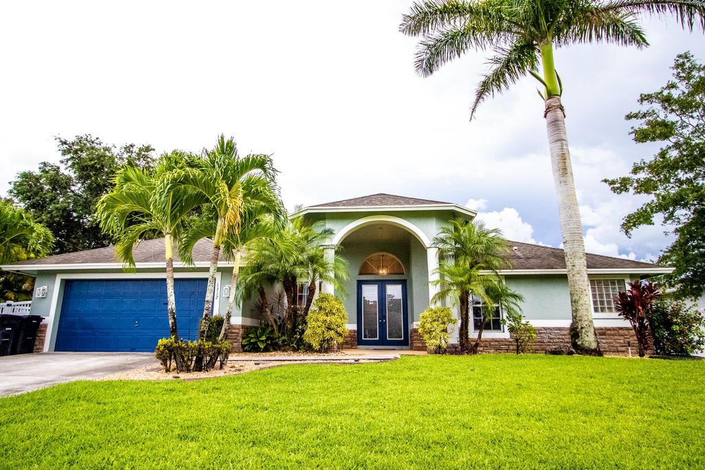 Photo of 1312 SW Jericho Avenue, Port Saint Lucie, FL 34953 (MLS # R10907945)