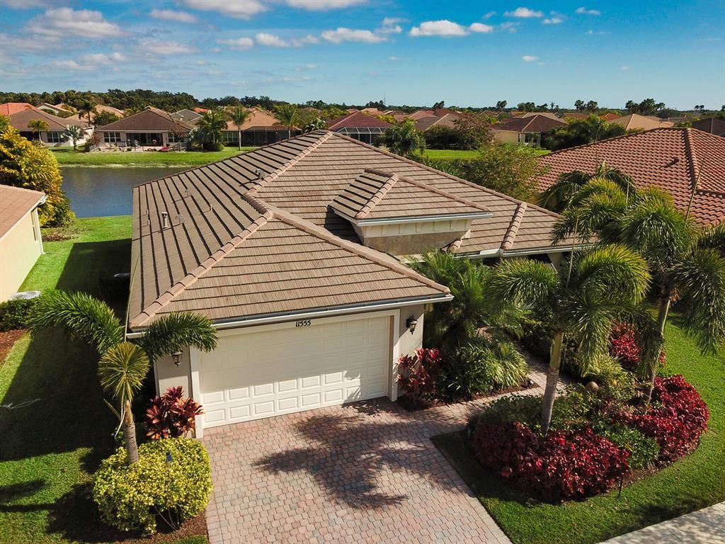 Photo of 11555 SW Apple Blossom Trail, Port Saint Lucie, FL 34987 (MLS # R10688589)