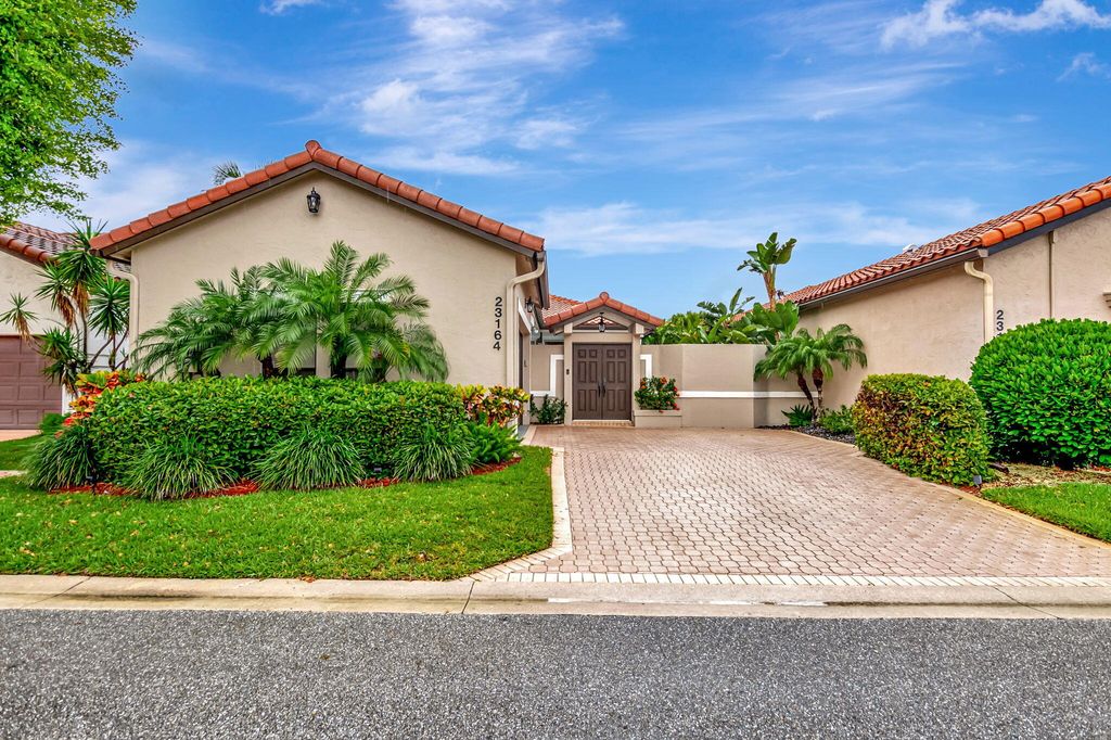 Photo of 23164 Via Stel, Boca Raton, FL 33433 (MLS # B26023931)