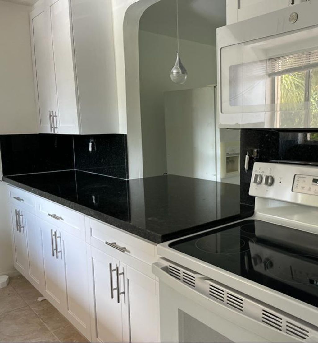 Photo of 848 SW 9th Street Circle #205, Boca Raton, FL 33486 (MLS # R10990857)