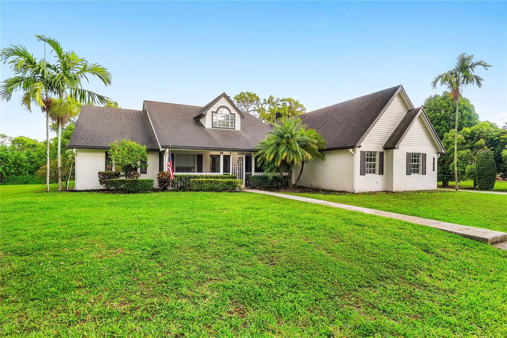 Photo of 14117 N 74th Street, The Acreage, FL 33470 (MLS # F10511265)