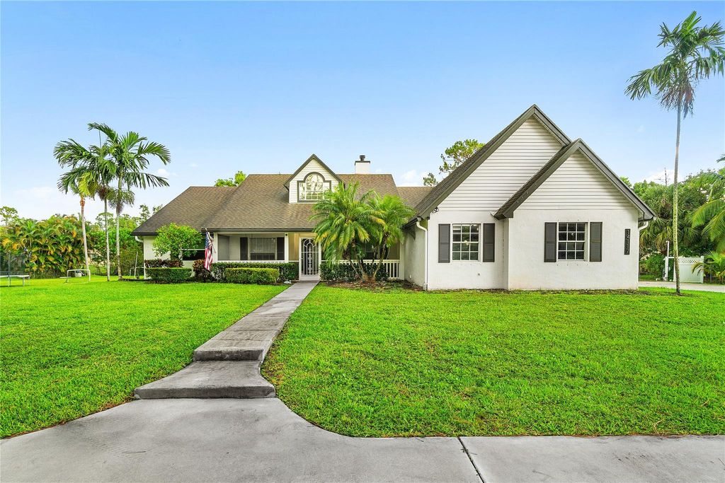 Photo of 14117 N 74th Street, The Acreage, FL 33470 (MLS # F10511265)