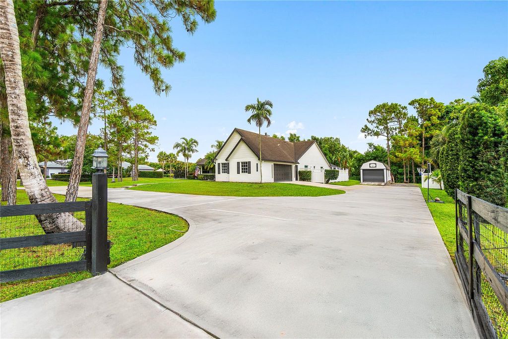 Photo of 14117 N 74th Street, The Acreage, FL 33470 (MLS # F10511265)