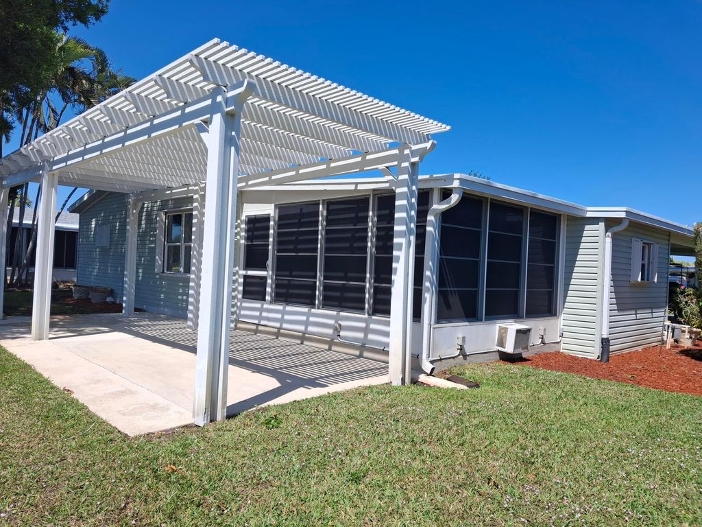 Photo of 3017 Five Iron Drive, Port Saint Lucie, FL 34952 (MLS # R11043168)