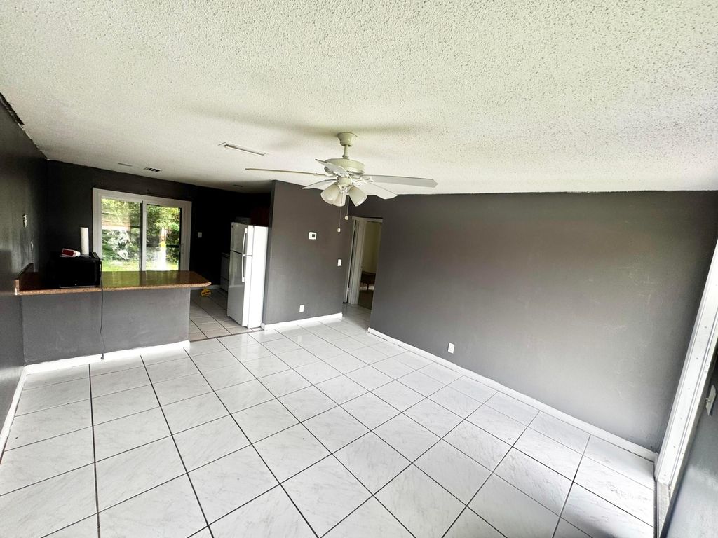 Photo of 2993 SE Camino Avenue, Stuart, FL 34997 (MLS # R11136501)
