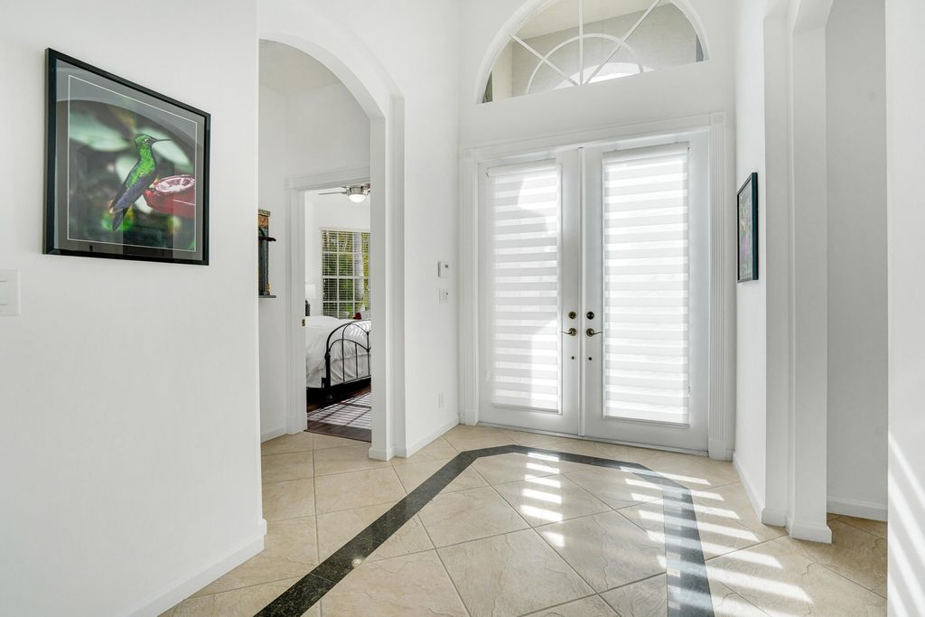 Photo of 10916 Northgreen Drive, Lake Worth, FL 33449 (MLS # B26023320)
