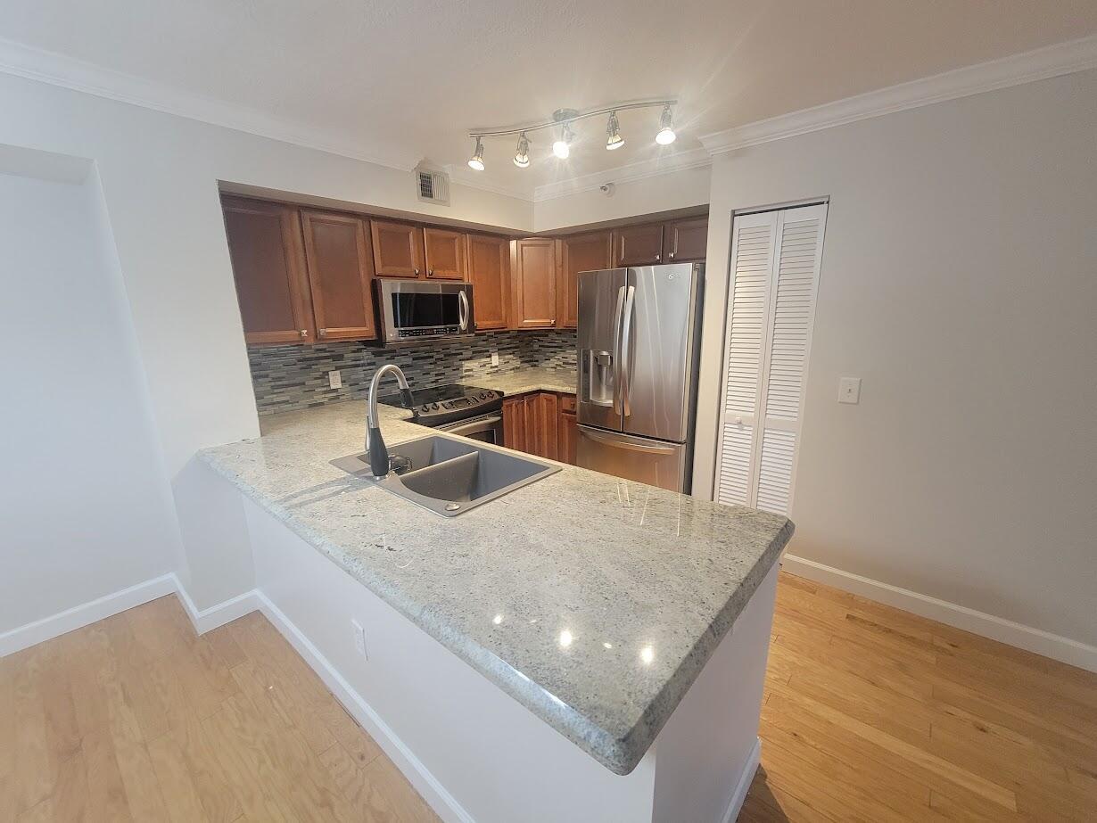 Nice clean, updated right on the intracoastal. Freshly painted and ready for move in. Community pool is right on the intracoastal with great views of the marina Gated community.