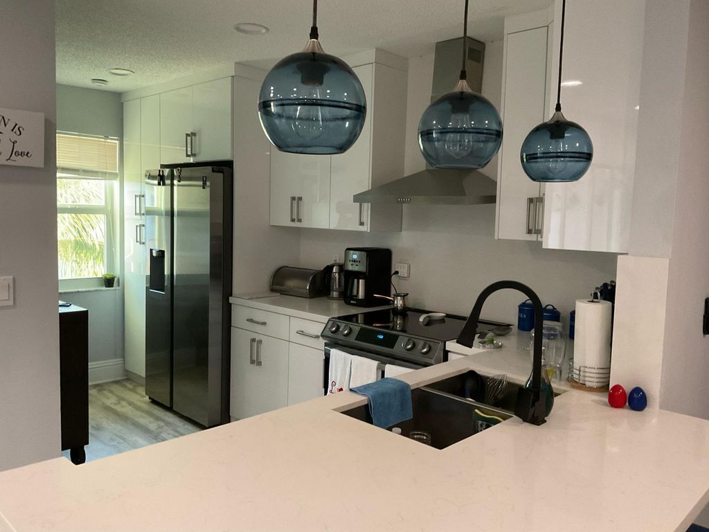Photo of 14898 Wedgefield Drive #202, Delray Beach, FL 33446 (MLS # B26028260)