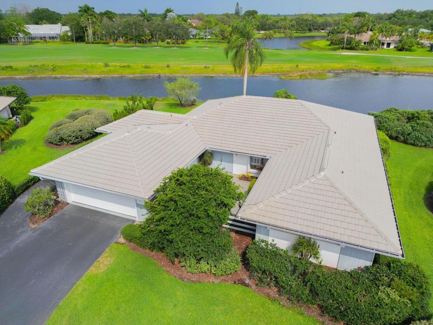 Charming 3-bedroom, 2.5-bath 2-car garage with seperate golf cart entrance. This home boasts breathtaking views of the lake and golf course. Nestled in a luxury private golf and yacht community, this property sits on a premium lot, offering unparalleled tranquility and exclusivity. While this home is move in ready it could benefit from some updates, Its prime location provides the perfect canvas for your dream home. Embrace the opportunity to create a personalized oasis in this prestigious setting. the amenities include but are not limited to Onsite security, area pools, grounds maintenance, cable, fitness center, Pickleball & Tennis Facilities  as well an 18 hole Championship Golf Course. Marina access and many additional services are also available. This is a mandatory equity community with $65,000 Equity ($25,000 refundable), $30,000 Capital Contribution.