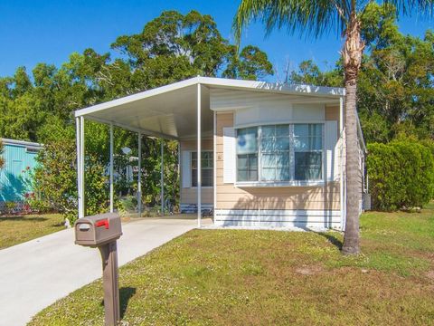Photo of 61 E Caribbean, Port Saint Lucie, FL 34952 (MLS # R11147090)
