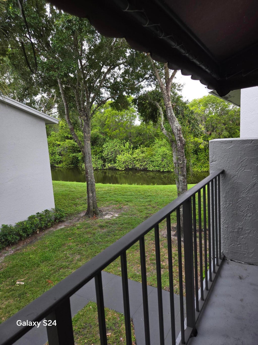 Photo of 1141 LAKE VICTORIA Drive #H, West Palm Beach, FL 33411 (MLS # B26055492)