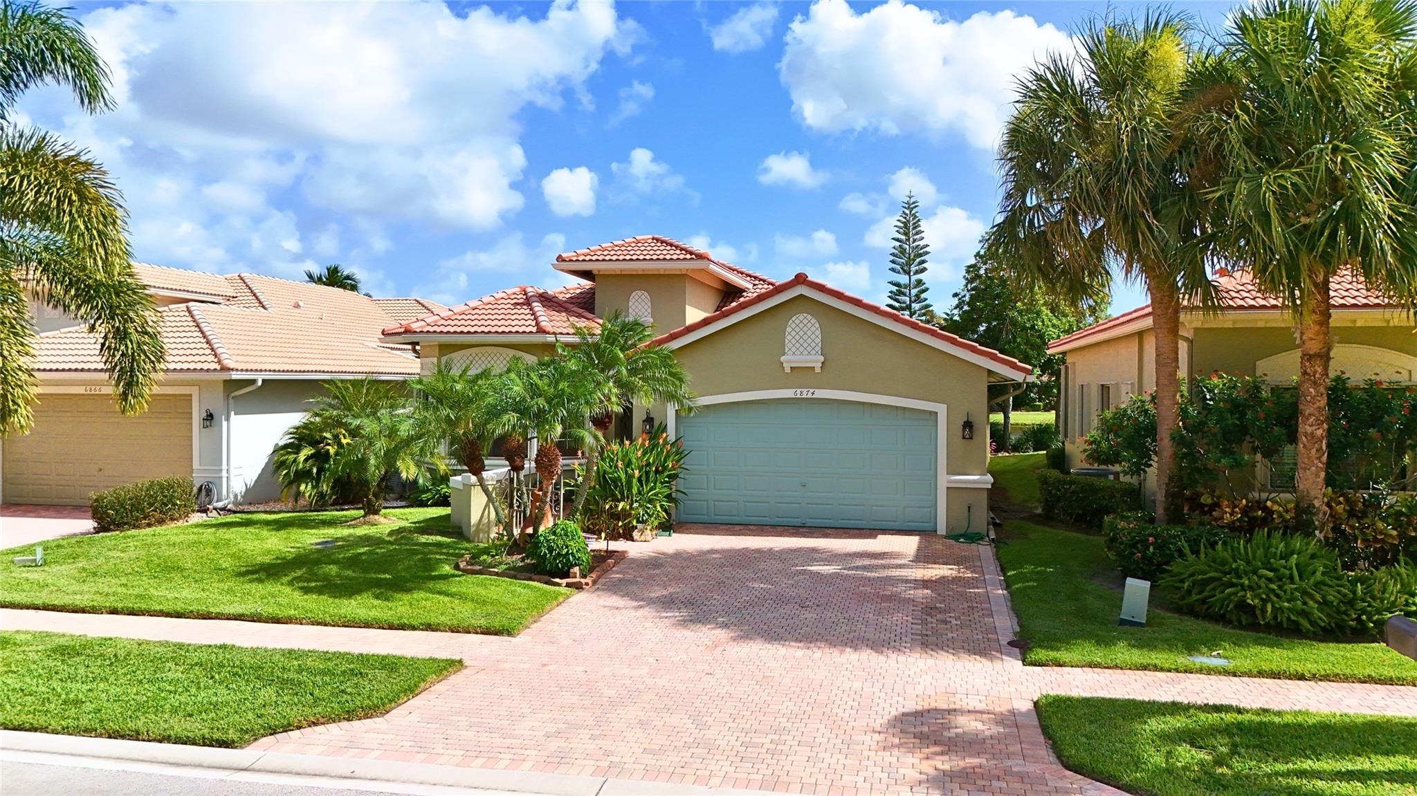 Live the South Florida lifestyle you’ve been dreaming of in Tivoli Lakes, an active adult gated community offering maintenance-free living and resort-style amenities, including clubhouse, fitness center, pools, tennis, pickleball, and more! Enjoy living just minutes from shops, dining, and major highways. This former model home features 3 beds, 2 baths, nearly 2,000 sqft of living space, serene lake views, elegant coffered ceilings with crown molding, and abundant natural light. Additional highlights include hurricane shutters, a whole-house standby generator, tankless water heater, and an EV charger outlet. The spacious kitchen features granite countertops and ample cabinet space. Wake up to lake views, hit the pickleball courts, & enjoy a lifestyle where every day feels like a vacation!
