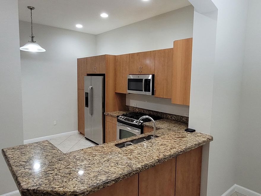 Well maintained penthouse level 2/2 condo unit in Artesia. Just across to Sawgrass Mills.  Easy to access major highway.  Resort style club house offers 3 pools, gym, jacuzzi, basketball, tennis court, billiards, playground and much more. 24hrs security guard at the gate. 2 assigned parking space in the covered garage. The unit features split bedroom floor plan. Both bedrooms have laminated wood floors. Living room, kitchen and bathrooms have tile floors. Granite countertops and stainless steel appliances.   Full size washer/fryer inside of the unit.  Nice size private screened patio.  The unit is vacant and easy to show.  Use showing assist for schedule.   The seller is motivated and will consider all reasonable offers.