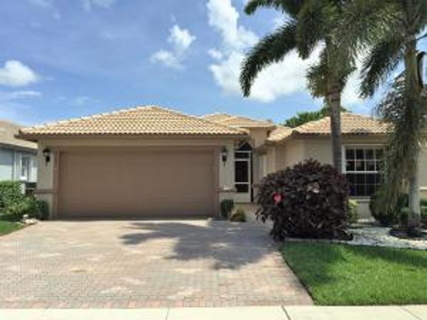 GORGEOUS home that has been TOTALLY UPGRADED - The LARGE EXPANDED AND TILED PATIO overlooks a GREAT WATER VIEW with a SOUTHERN exposure. The home has a DESIGNER look front door, a VERY OPEN floor plan, and is TILED THROUGHOUT. The kitchen has WOOD CABINETS, GRANITE COUNTERS, STAINLESS APPLIANCES, and a beautiful BUILT IN PANTRY. The master bedroom has PLANTATION SHUTTERS and the DESIGNER LOOK master bath looks like one in a model home. The living area, MBR, and bedroom 4 have CROWN MOLDING. The home has ACCORDION storm shutters, a generator outlet, 2011 A/C, and a 2012 water heater. Don't miss seeing this incredible home. Venetian isles is located close to multiple public golf courses and is one of the most active and desired communities in Boynton Beach. Our 26,000 sq. Ft. clubhouse is the center of the many social and recreational activities in our community. Our facilities include a large show/party room, card rooms, exercise room, library/computer room, billiards, arts & crafts room, etc. Two relaxing pools overlook a beautiful lake - one for regular swimming and the other for resistance exercise.  
THE FOYER AND DINING AREA CHANDELIERS DO NOT CONVEY WITH THE PROPERTY.
The model floor plan, selling disclosures and Homeowner's Association application are in the "Document" on this listing.