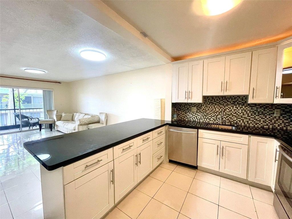 Photo of 4159 NW 90th Avenue #204, Coral Springs, FL 33065 (MLS # F10511469)