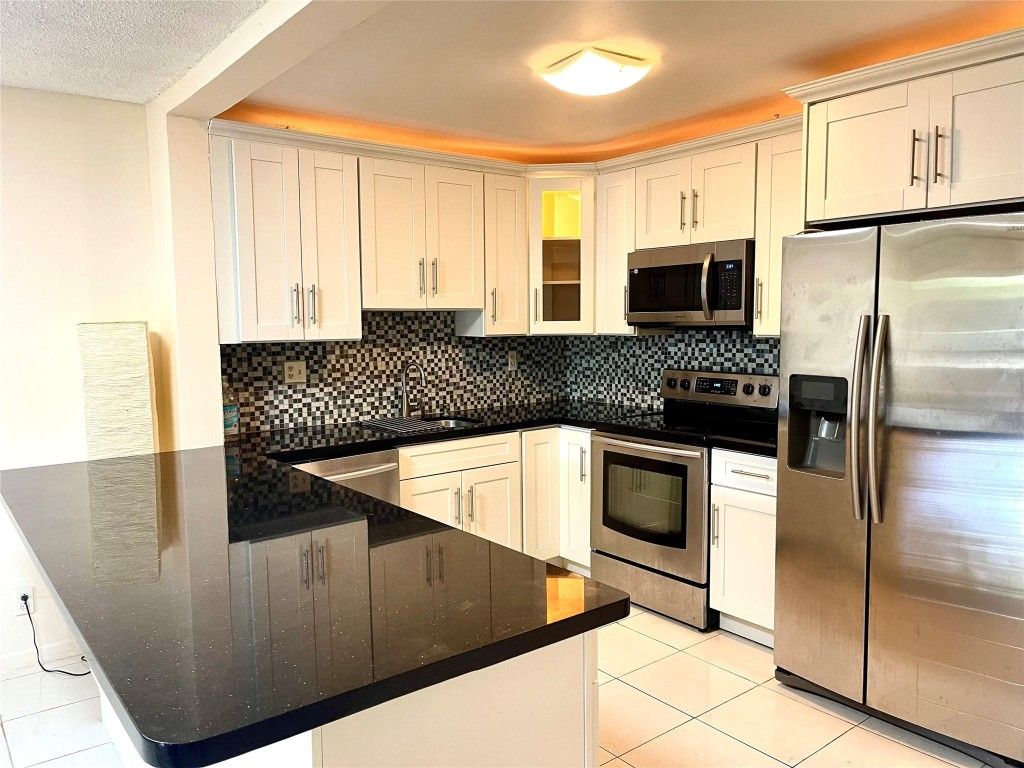 Photo of 4159 NW 90th Avenue #204, Coral Springs, FL 33065 (MLS # F10511469)