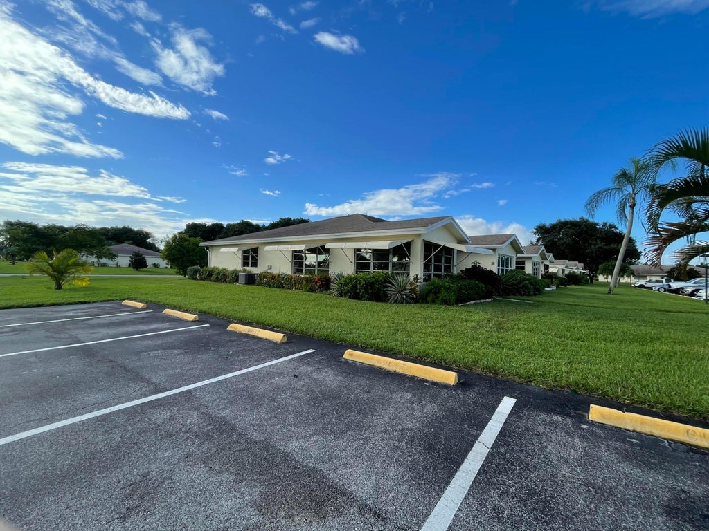 Photo of 5198 LAKEFRONT Boulevard #A, Delray Beach, FL 33484 (MLS # B26080539)