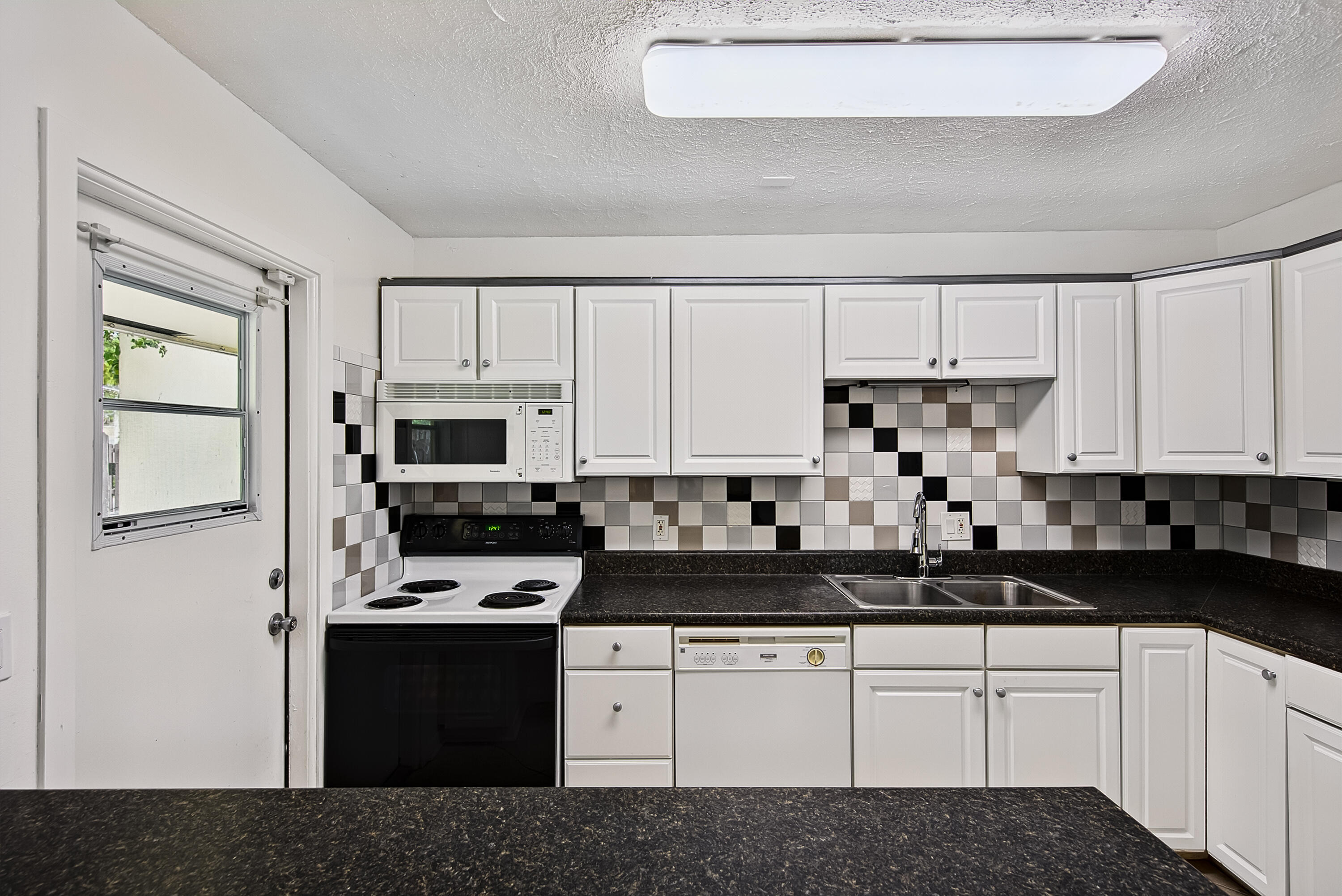 NO 1 PALM-AIRE VILLAGE CONDO - Residential