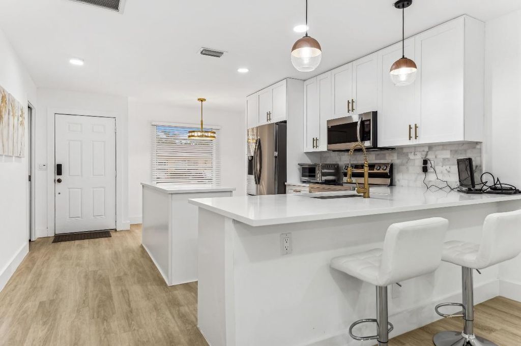 Photo of 13725 Flora Place #D, Delray Beach, FL 33484 (MLS # R11096004)