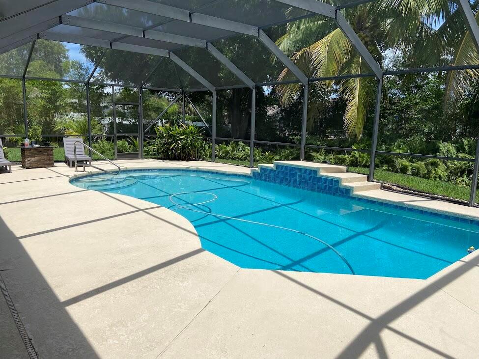Outstanding Opportunity to live in Pinecrest Lakes, One of Martin County's Premier Residential Neighborhoods! - Available Furnished or Unfurnished -!! Discover this Solid Concrete Block 3 Bedroom, 2 1/2 Bathroom Pool Home + Office ''PLUS'' a 3 Car Garage - ALL on a Private Cul-de-Sac Location! The Large Covered & Screened Lanai overlooking the Pool area is the Perfect Backdrop to Entertain, Cook-out or Relax with Family & New Friends. The Community is Vibrant & offers ''Green Spaces'' plus 2 dedicated park areas. Top-Rated Martin County Schools + Pet & Truck Friendly ++ Pool & Lawn care fully included! Quick & convenient to Jensen, Historic Downtown Stuart, Shopping, Dining, the Treasure Coast Waterways plus Hutchinson Island Beaches.