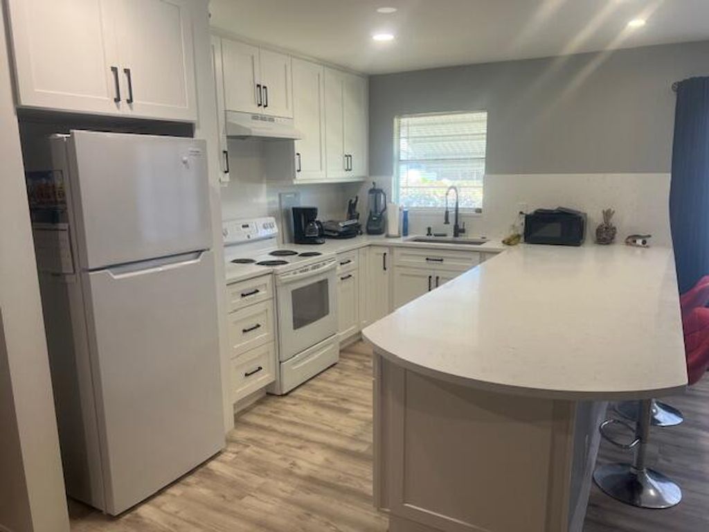 Photo of 3200 Park Lane #C, Boynton Beach, FL 33435 (MLS # R11168159)