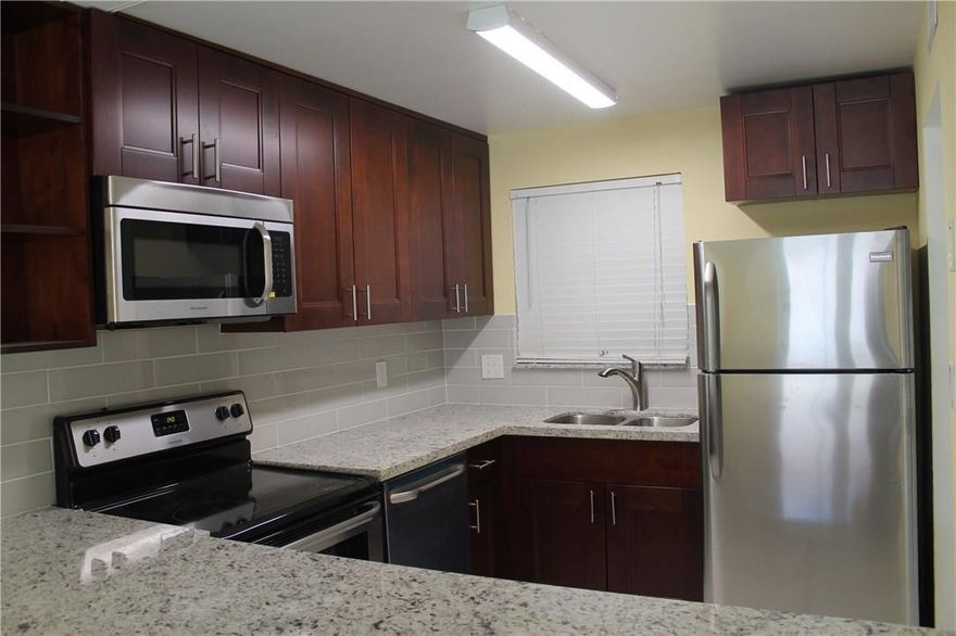 FIRST FLOOR CORNER UNIT ON A LAKE IN AN ACTIVE 55+ COMMUNITY, FULLY RENOVATED AND UPGRADED ( $15,000 )THE PERFECT PLACE FOR SNOWBIRDS. LOTS OF AMENITIES FROM THE ASSOCIATION WHILE KEEPING THE MONTHLY FEE LOW, CENTRALLY LOCATED IN SUNRISE AND MOVE IN READY FOR YOUR BUYER!
