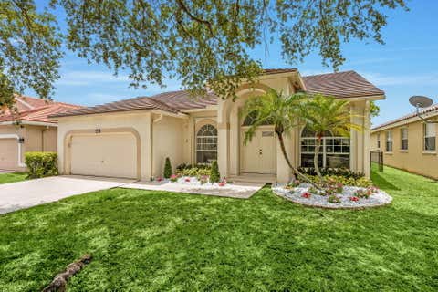 Photo of 5954 NW 74th Street, Parkland, FL 33067 (MLS # B26039358)