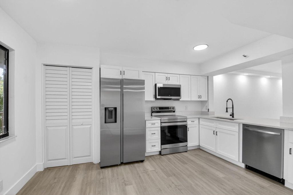 Photo of 14475 Strathmore Lane #208, Delray Beach, FL 33446 (MLS # B26022125)