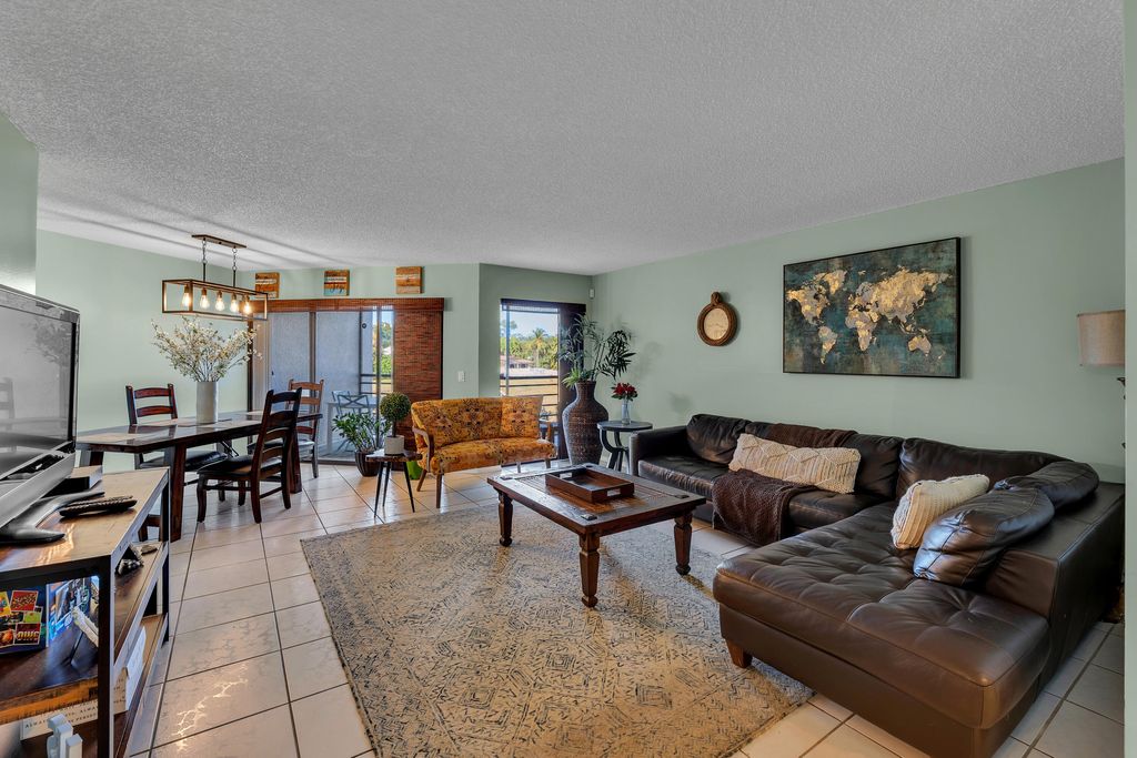 Photo of 5650 Camino Del Sol #205, Boca Raton, FL 33433 (MLS # R11148699)