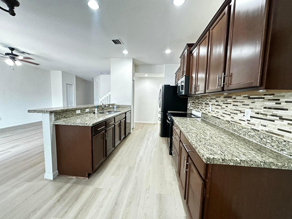 Photo of 5026 S ASTOR Circle, Delray Beach, FL 33484 (MLS # B26082490)