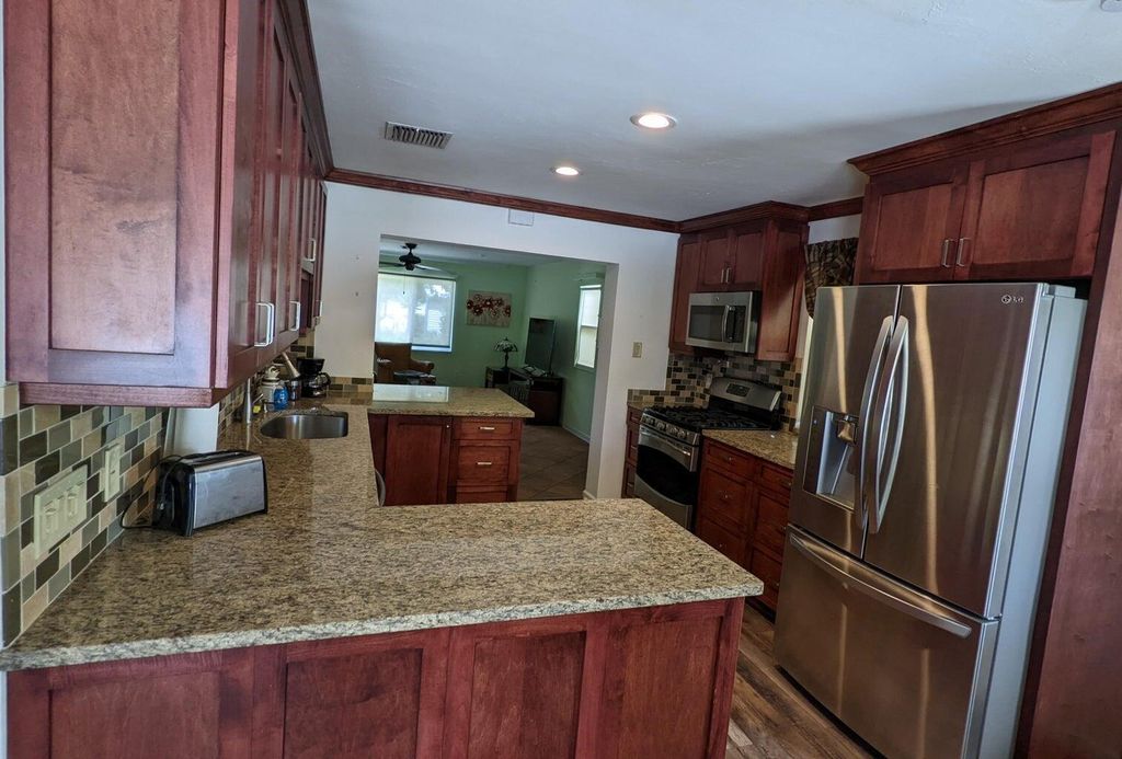 Photo of 1209 N M Street, Lake Worth Beach, FL 33460 (MLS # B26027831)