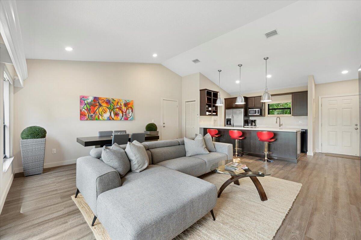 The perfect little spot for season - this unit has everything you need - a pond view, walking distance to the community pool, fitness center, tennis/pickleball center, and both community restaurants. Located within the gates of prestigious Palm Beach Polo Club, this unit is just minutes from WEF, Global Dressage, and all shops and restaurants. It is also only 20 minutes from downtown WPB and 30 minutes to Palm Beach. Flat Utility Fee of $200/mo. AVAILABLE OCT, NOV, DEC ONLY.