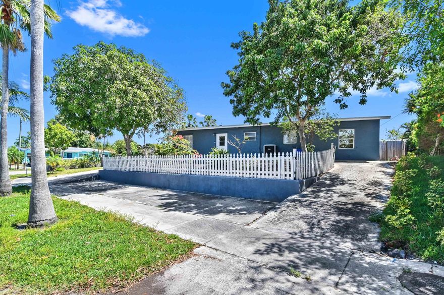 Tremendous opportunity to rent this FULLY FURNISHED pool home in Lantana, less than 2 miles from the beach! This updated corner-lot property features 3 bedrooms, 2 full baths, a living room, family room, plus a BONUS ROOM set up as an extra bedroom. RENTAL AVAILABLE SEPTEMBER - NOVEMBER 2025.Enjoy a new roof (2022), newer AC, gas water heater, SS appliances with washer & dryer, granite counters, and wood-look laminate floors. Relax by the private pool, take advantage of the large circular driveway with extra parking, and enjoy fresh mangoes from your own tree. No HOA--bring your boat or RV!
