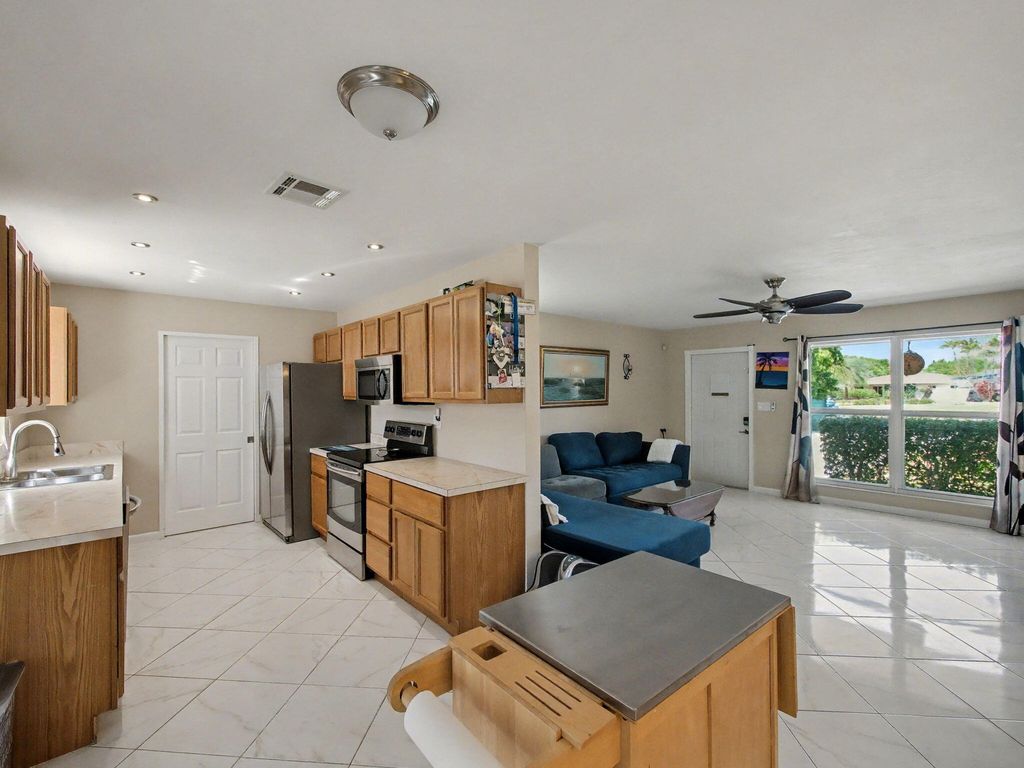 Photo of 530 Australian Circle, Lake Park, FL 33403 (MLS # R11162941)