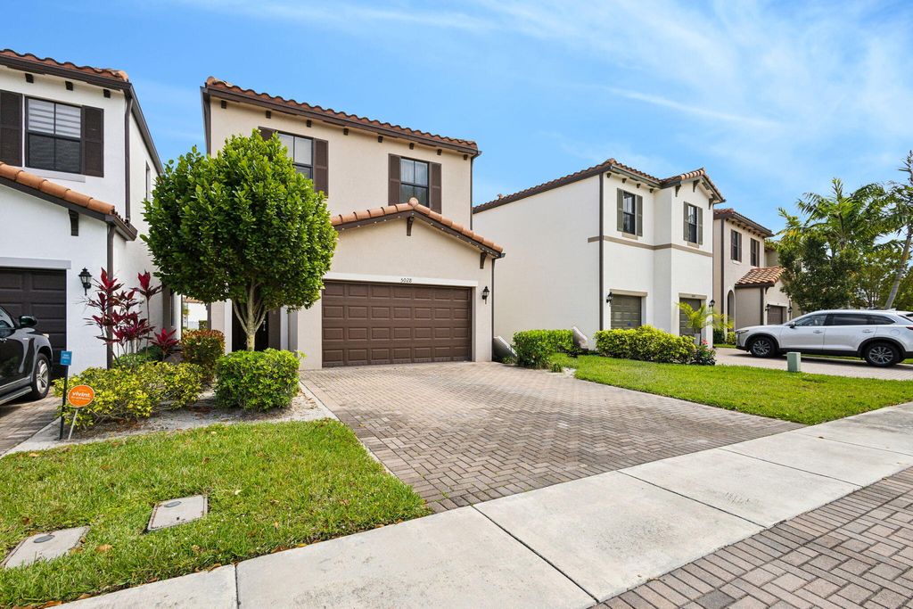 Photo of 5028 Laurel Oak Drive, Riviera Beach, FL 33410 (MLS # R10973101)
