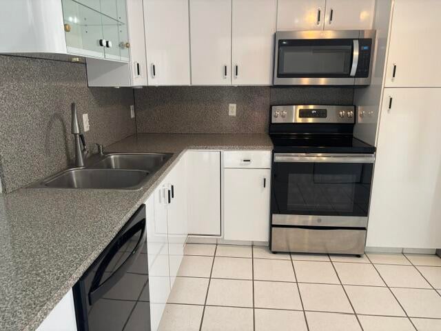 Photo of 79 WOOD ROSE Court, Royal Palm Beach, FL 33411 (MLS # B26083569)