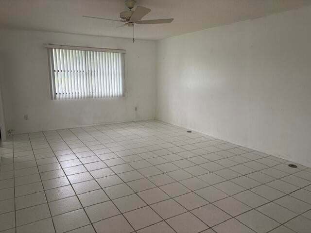 Photo of 79 WOOD ROSE Court, Royal Palm Beach, FL 33411 (MLS # B26083569)