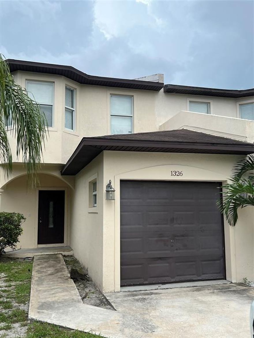 Beautiful Townhouse — 2 bedrooms plus a den (3 rooms upstairs), 2.5 baths, and a 1-car garage. Features ceramic tile in the kitchen, granite countertops, wood cabinets, and more! Both the master and second bathrooms include tubs. No HOA!