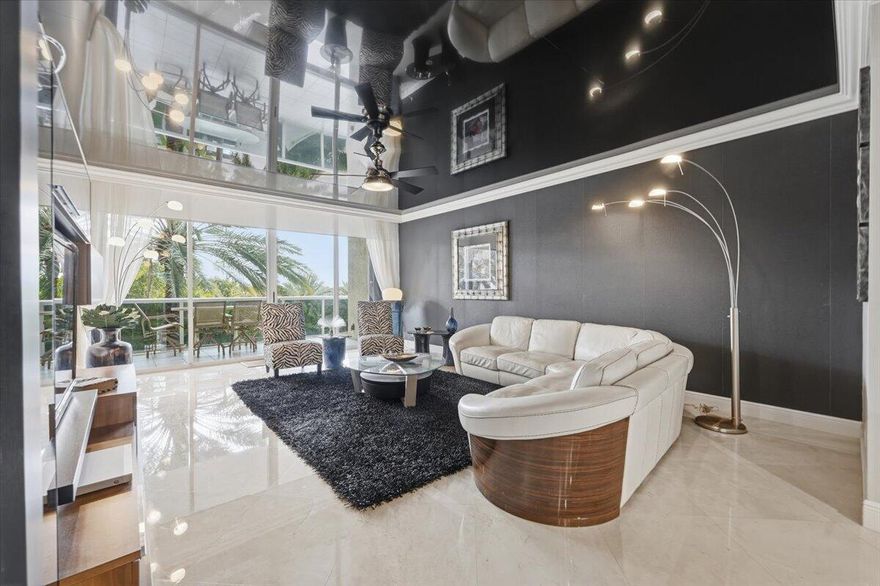 A Beautiful Contemporary Renovation for this 3 Bedroom, 2.5 Bathroom, South East Exposure Garden View Unit. Private Elevator.  Easy to see! RESORT LIKE Living with Poolside Restaurant, 2 Pools, Spa, Concierge, Valet plus SELF PARKING IN GARAGE (Garage has Electric 0utlet too). 2 Tennis Courts, Beach  Attendants , Cabanas Pet Park, 2 Pets, Any Size, OK.