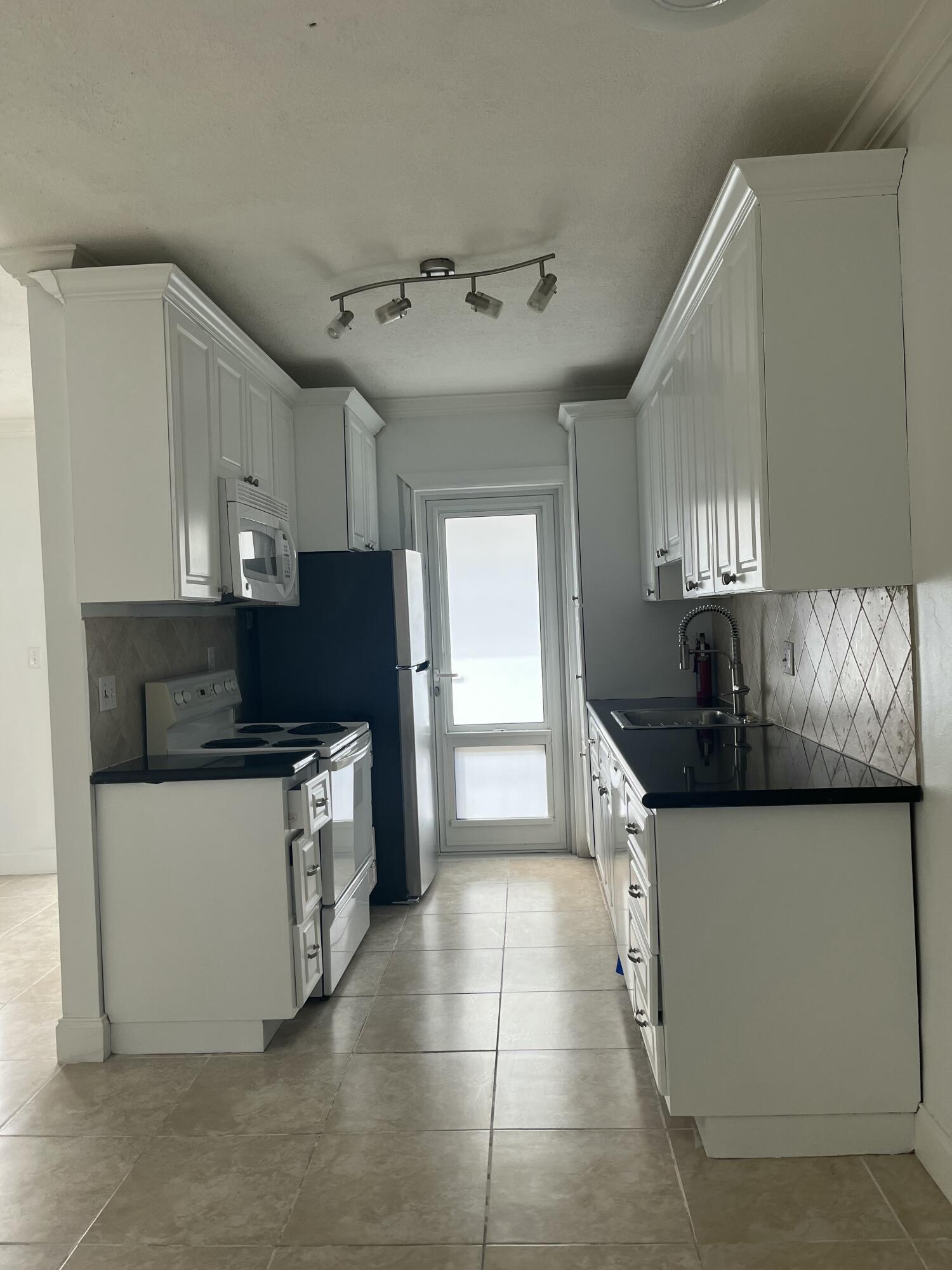 LEISURE GARDENS CONDO - Residential Lease