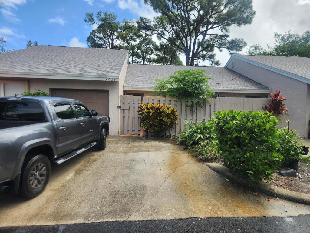 Photo of 5231 S Pine Abbey Dr Drive S, West Palm Beach, FL 33415 (MLS # B26013248)