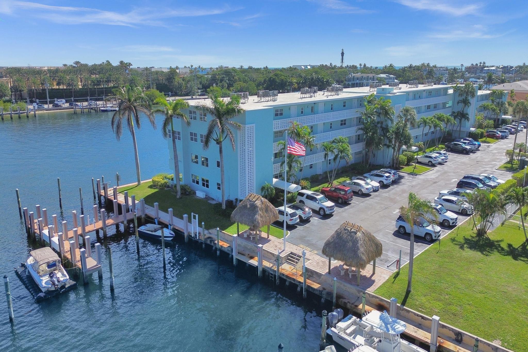 Move-in ready!!! Right on the Intracoastal in the Marina area of Lighthouse Point and only seconds to the Hillsboro Inlet and the Atlantic Ocean. This beautiful 2bed 2bath unit is light, bright, spacious and has full impact windows. Recently upgraded bathrooms with neutral tile and kitchen with new appliance package. Amazing views to the intracoastal, lighthouse, marina, and an endless parade of boats every day. Other amenities and services include clubhouse, pool, gazebo/tiki hut, assigned parking space next to the elevator and additional guest parking. Next to the Lighthouse Point Marina and Nauti Dawg restaurant. Private boat dock available for additional fee. Pick up trucks allowed. Make this beautiful, waterfront home your South Florida Oasis!