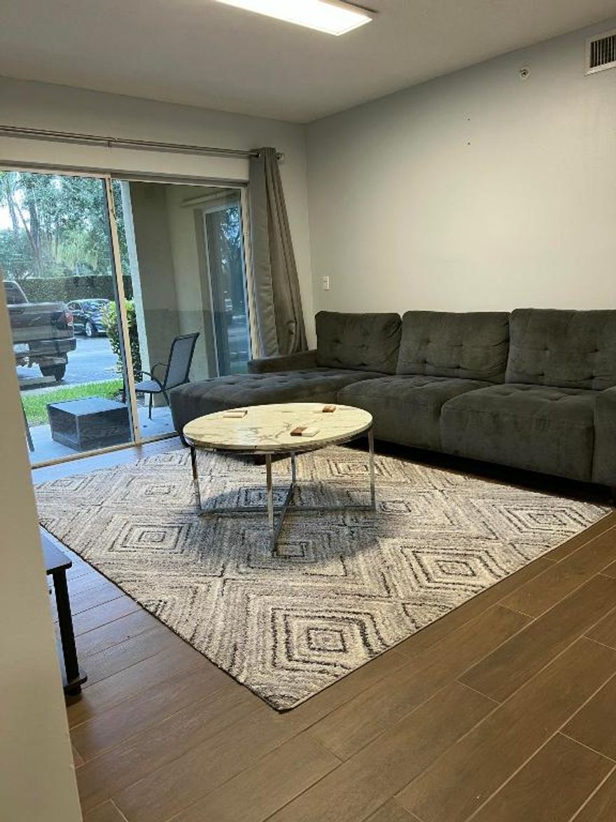 Perfect for investors or owner-occupants, this beautifully renovated first-floor condo features a desirable split floor plan ideal for families or roommates, with easy access and plenty of visitor parking. The community has been fully updated with a new roof (2021), freshly painted exteriors, and renovated common areas including a resort-style clubhouse, pool, gym, and billiards room.
The unit offers granite countertops, stainless steel appliances, and porcelain tile flooring throughout, with modern finishes in the kitchen and bathrooms. Prime location near Nova Southeastern University, Broward College, and UF Davie Campus, with convenient access to FLL Airport, major highways, shopping, and dining. Tenant occupied. 48-hour notice required. Leased through August 14 2026. $2350/Month