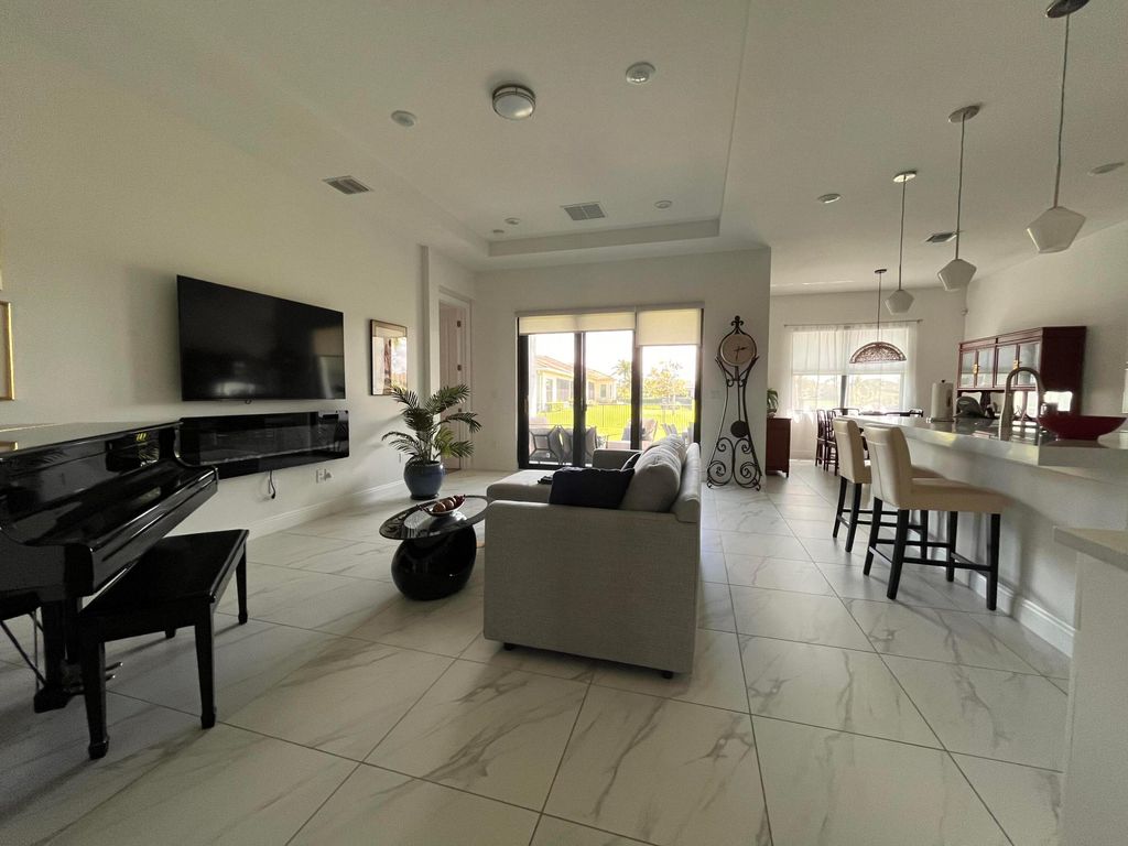 Photo of 5663 Saint Armands Way, The Acreage, FL 33470 (MLS # B26006422)