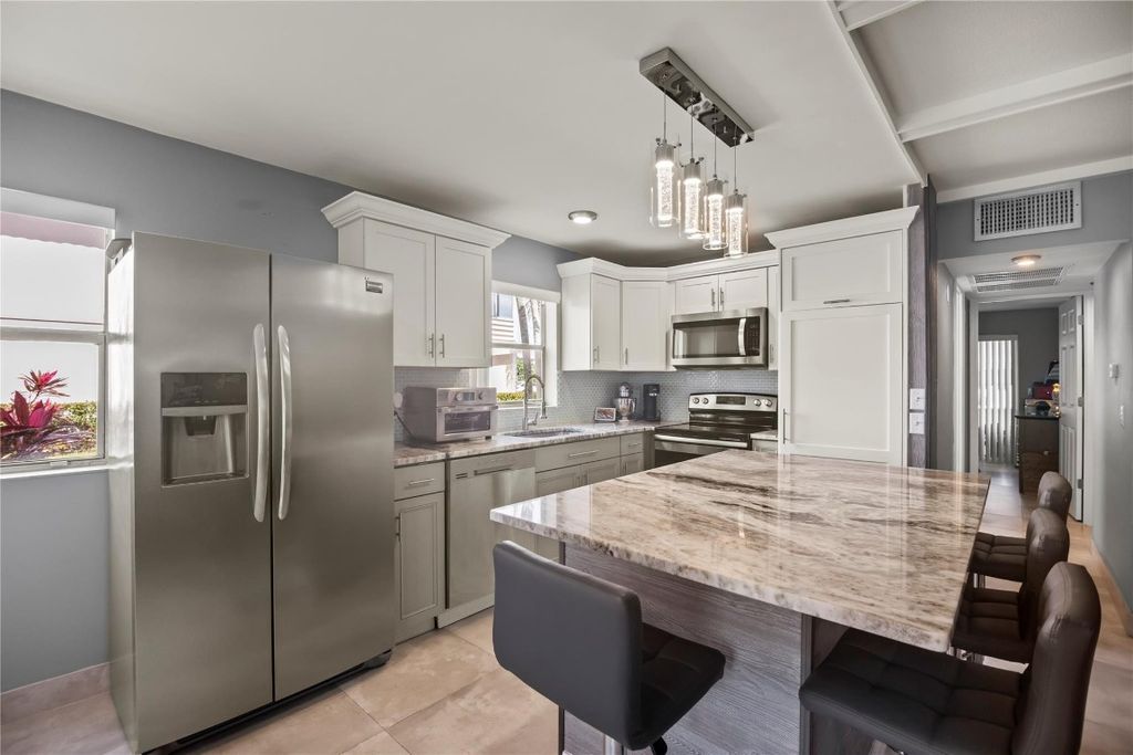 Photo of 352 Saxony Trail #352, Delray Beach, FL 33446 (MLS # F10426025)